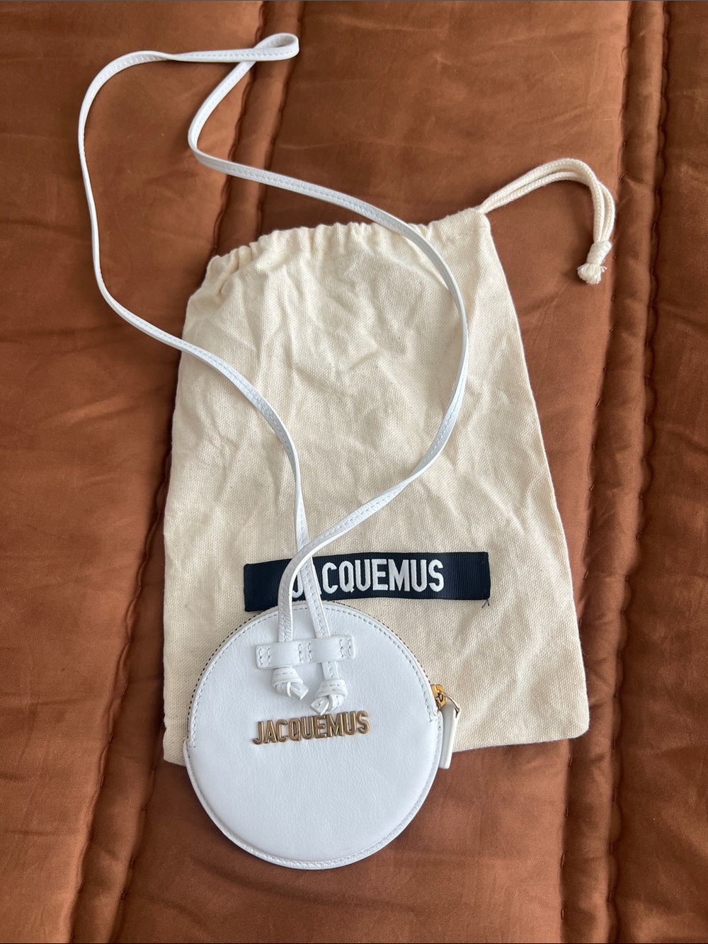 Jacquemus White Round Leather Lanyard with Gold Logo